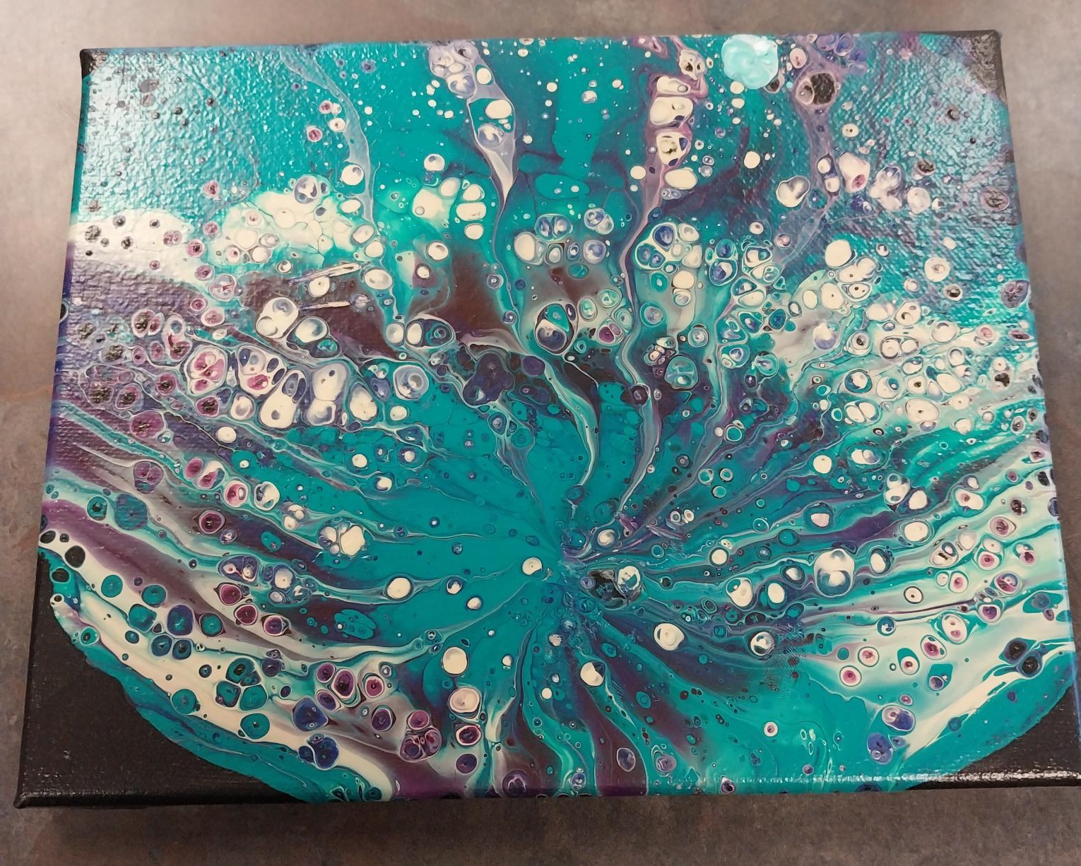 Image of a completed paint pour project.
