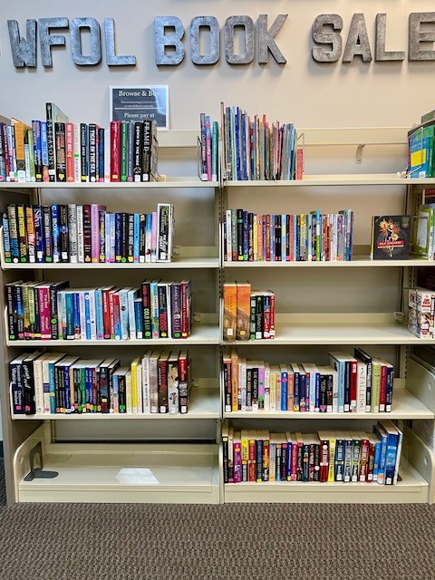 Picture of the Wilderness Freinds of the Library sale shelves at the Wilderness Library